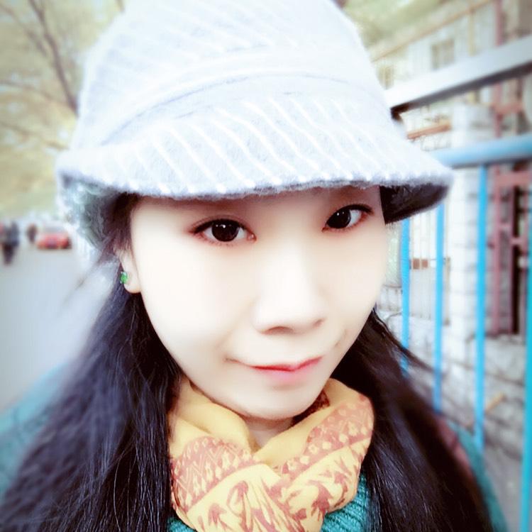 嫣然