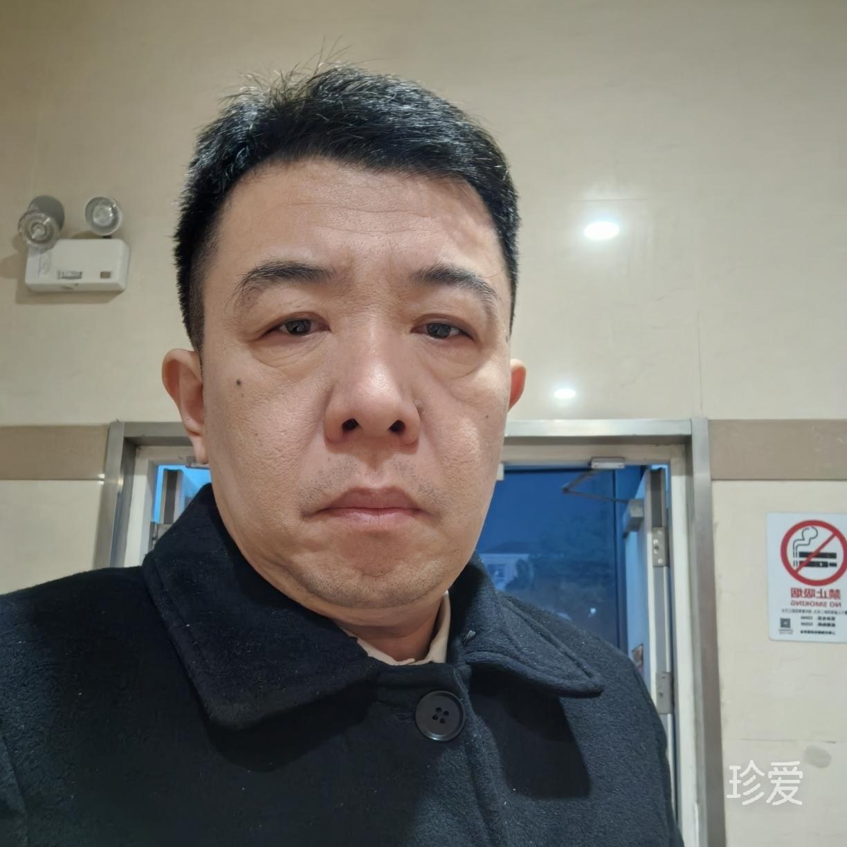 老张