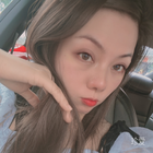 嫣然
