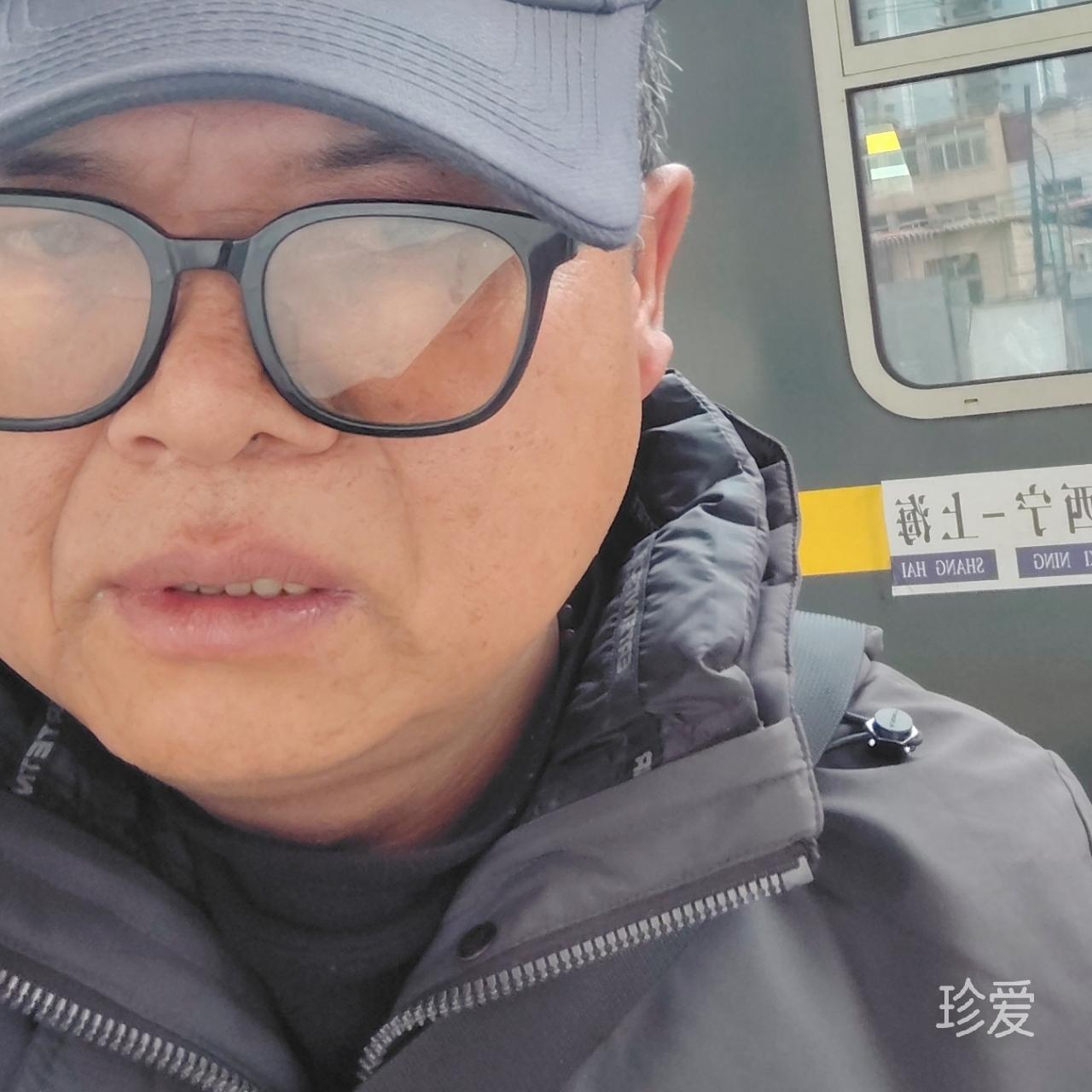 包文志坚