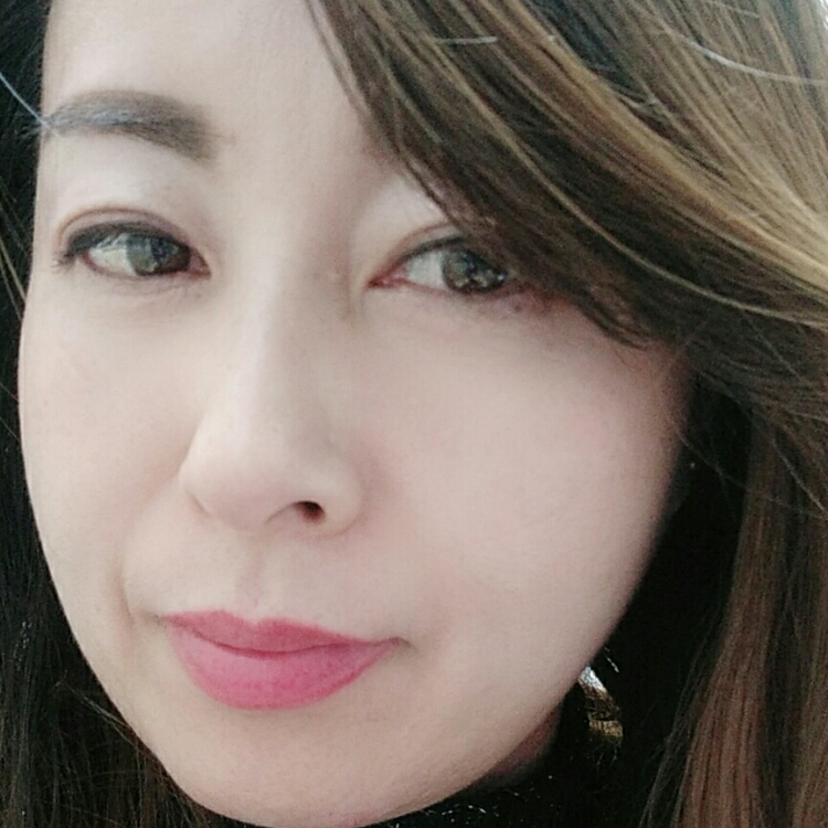 左眉里的痣