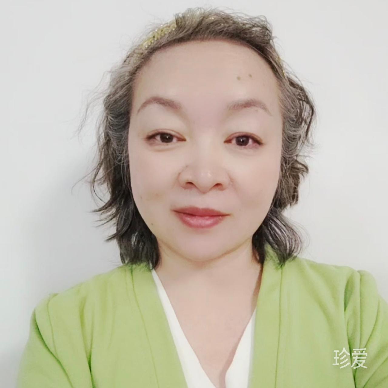 嫣然