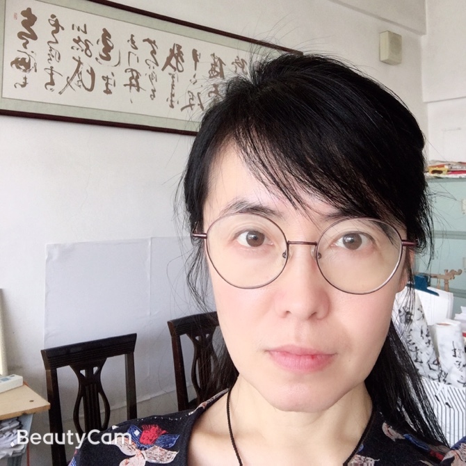 我见青山多妩媚