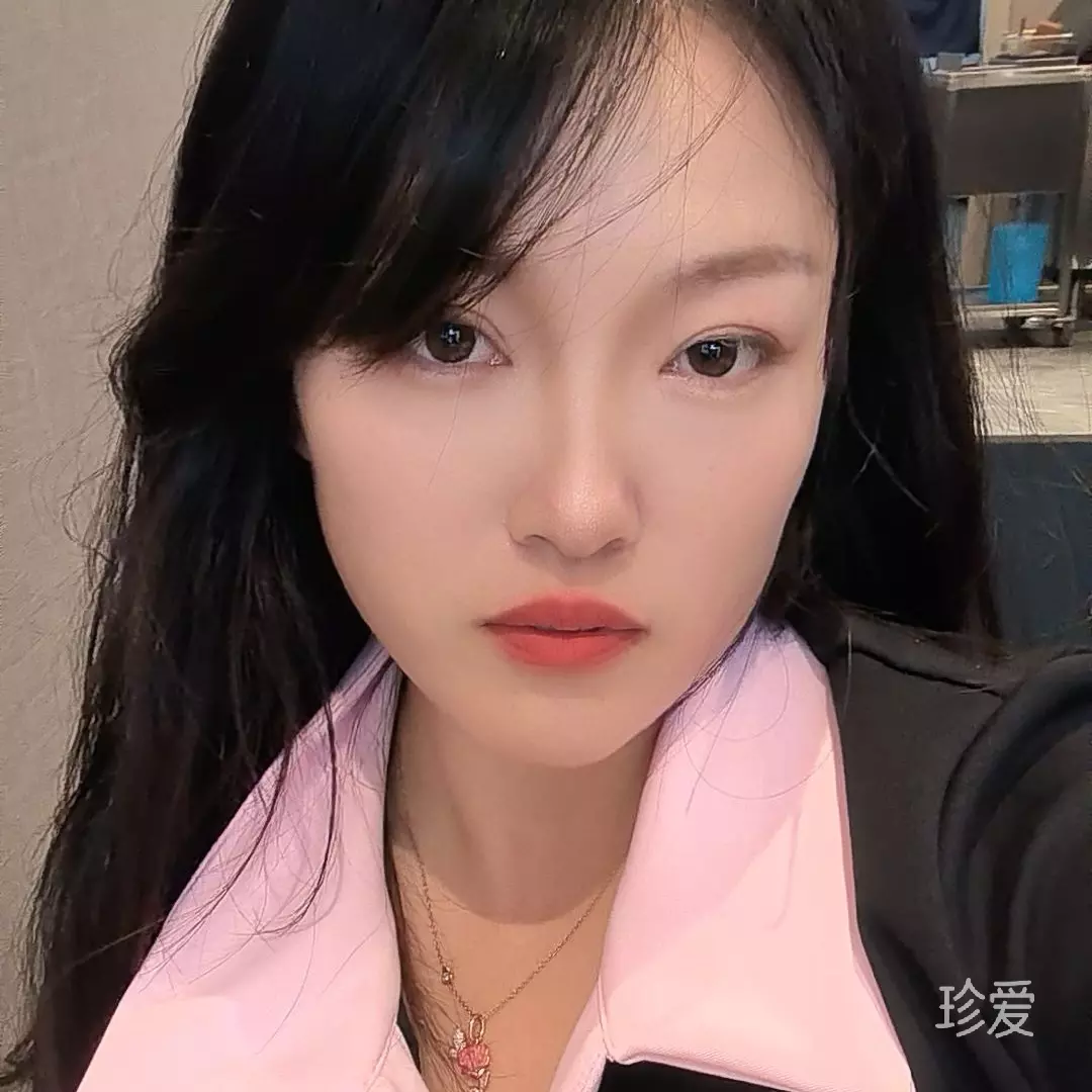 七七