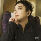 七七