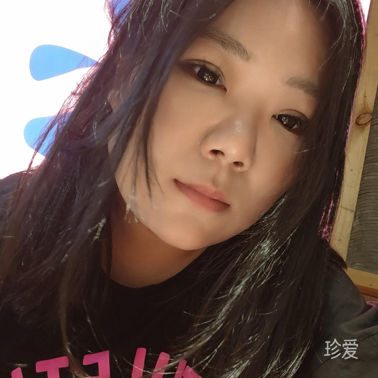 七七