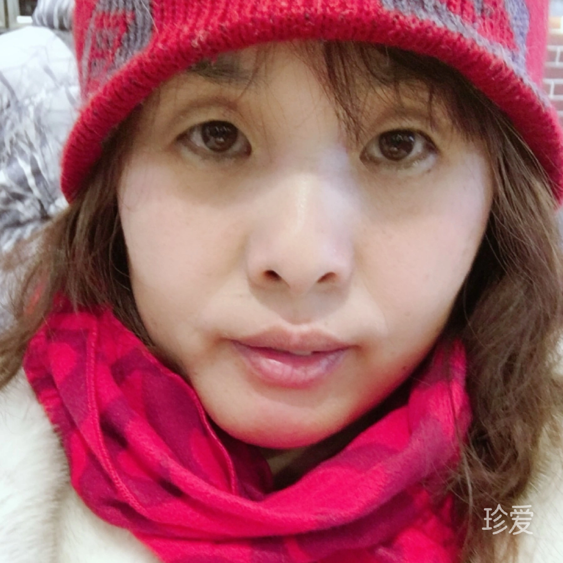 嫣然