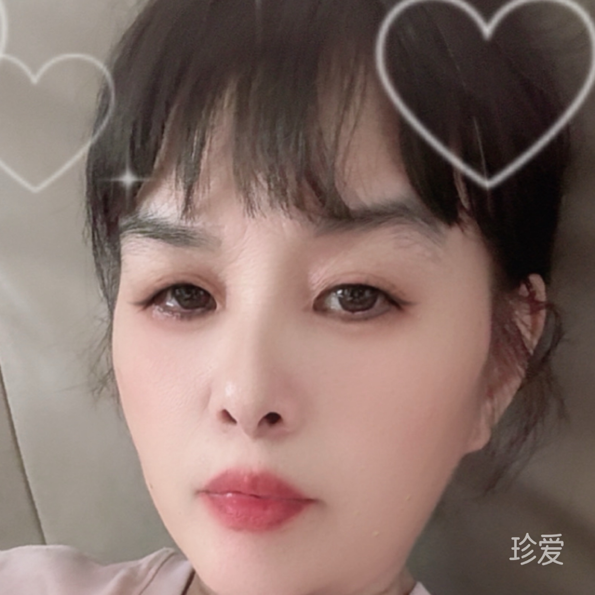 嫣然