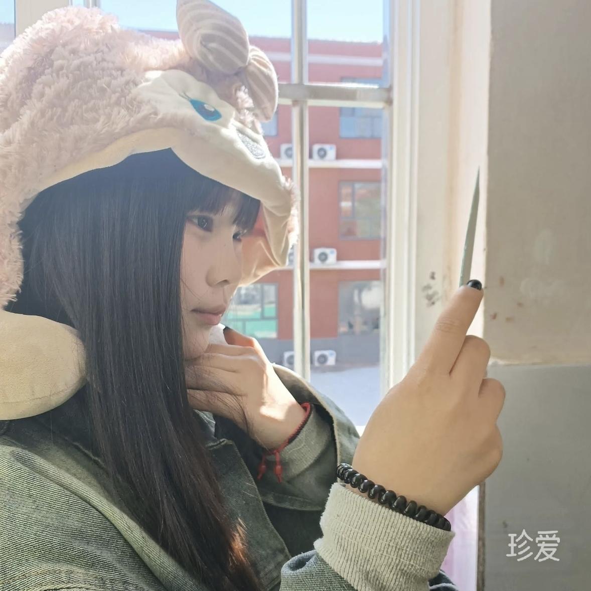 七七