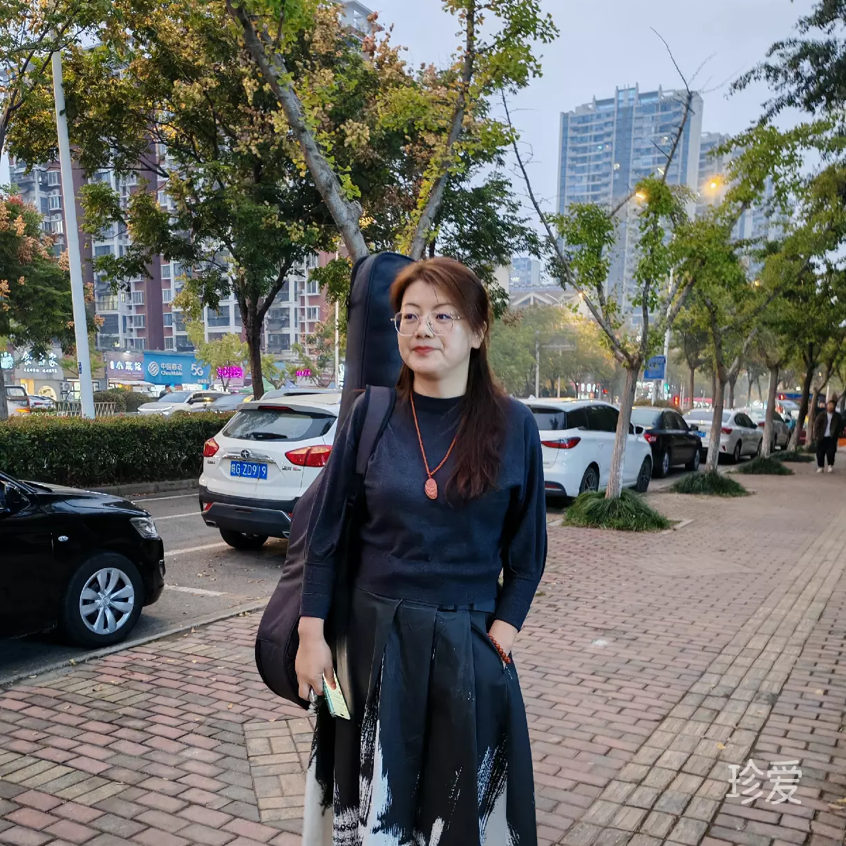 程女士