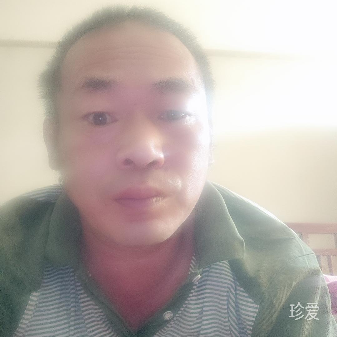 萬建根
