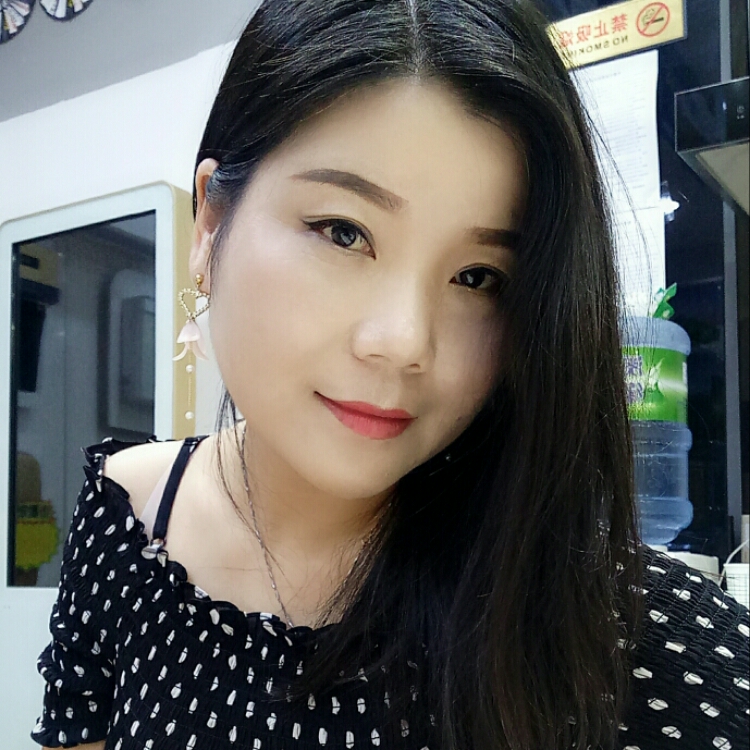 嫣然一笑