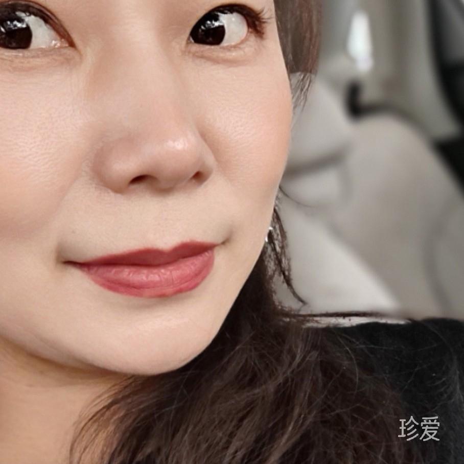 淡然一笑间