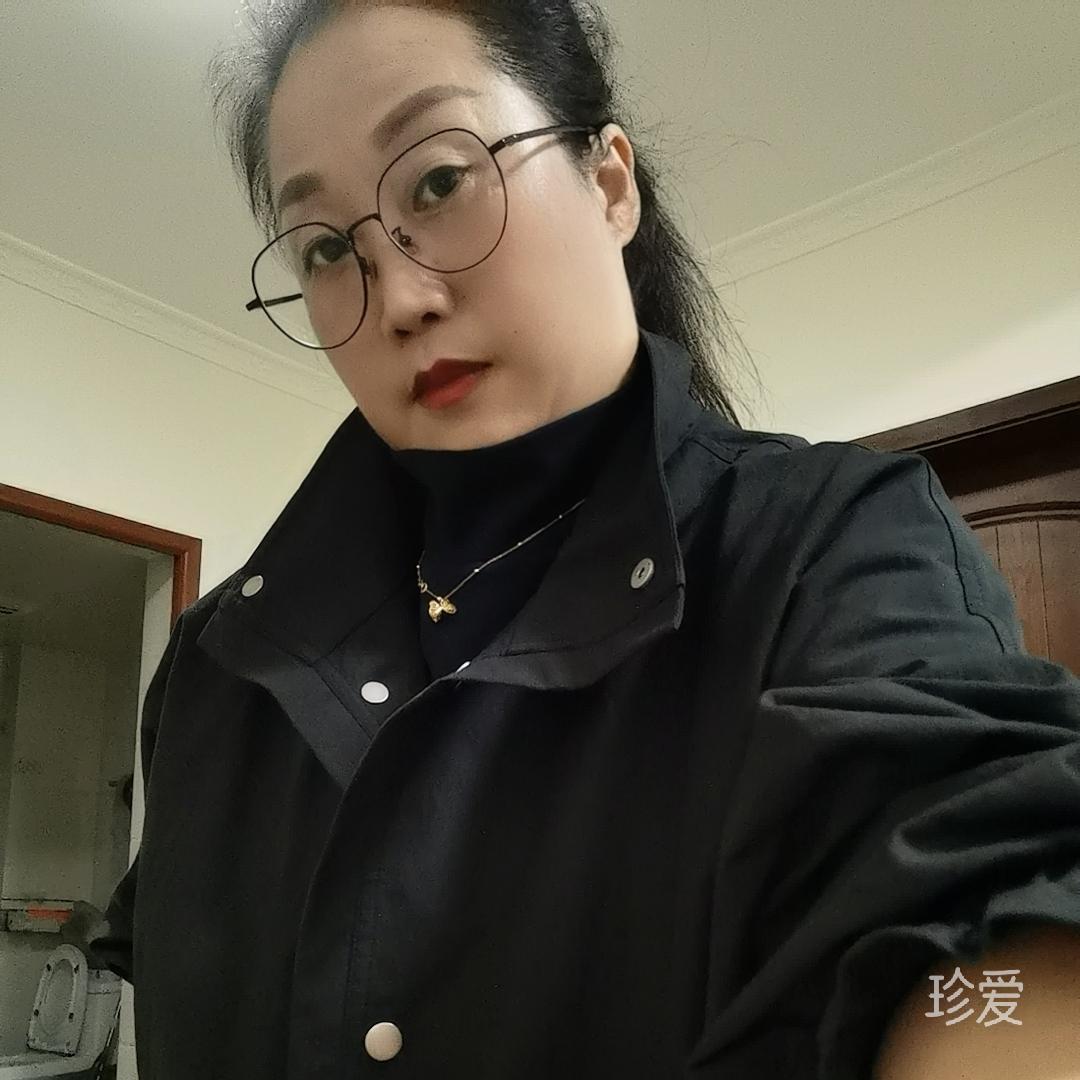 风雨中的一棵小草