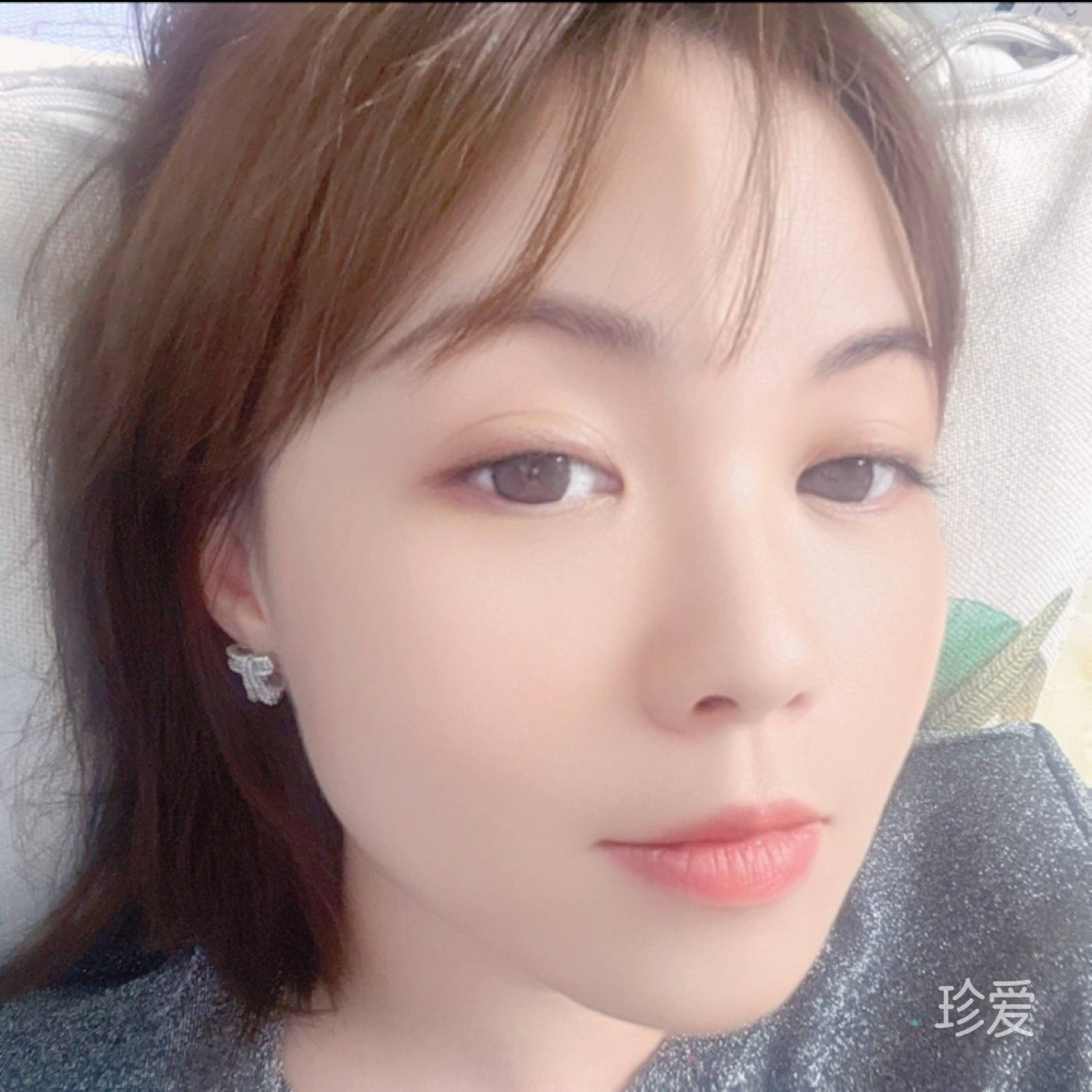 七七