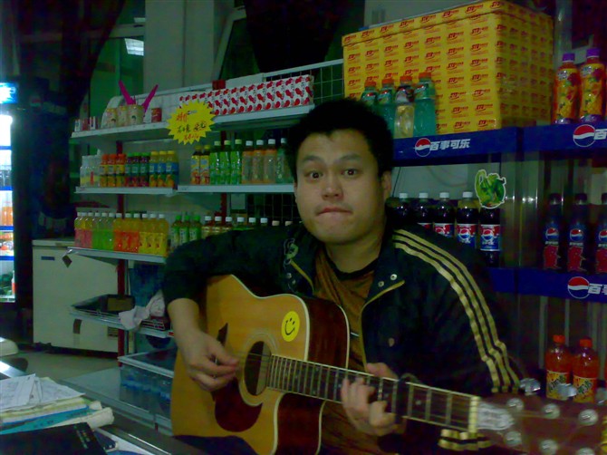 向陽(yáng)花下de木吉它